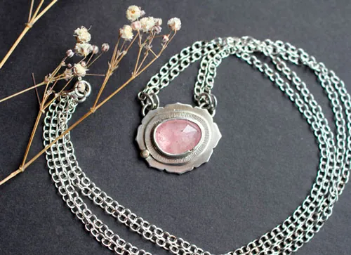 Supernova sapphire, astronomy necklace in silver, gold, and pink sapphire