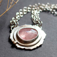 Supernova sapphire, astronomy necklace in silver, gold, and pink sapphire