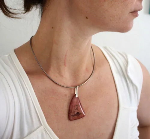 Symbiosis, marine union pendant in silver and red coral