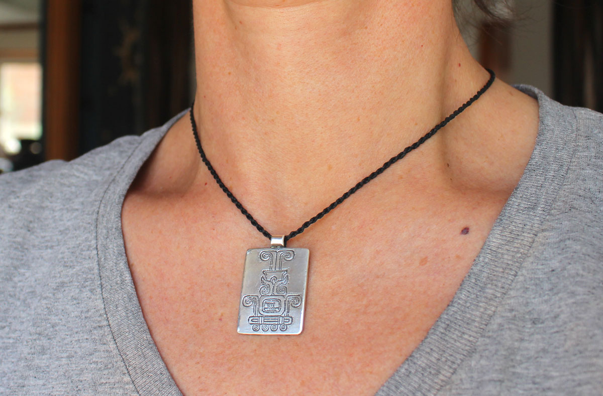 Sacred fire, Mexican Aztec glyph pendant in silver