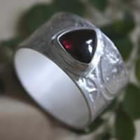 Sherlock Holmes, Neo-Victorian steampunk gear ring in silver and garnet