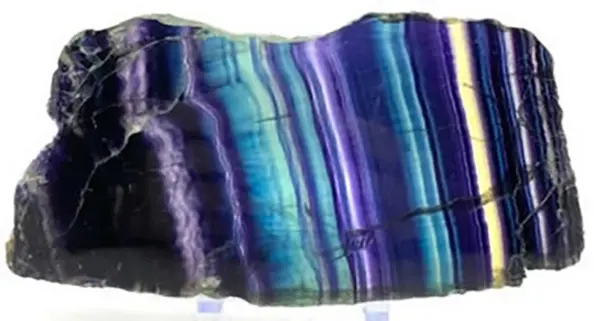Natural fluorite crystal with purple and green hues