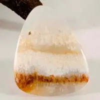 White plume agate cabochon