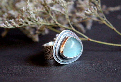 The blue of the waves, sea movement ring in silver and fluorite