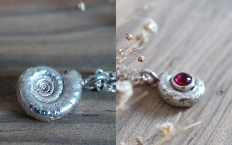 The cradle of life, nautilus Ammonite and birthstone necklace in silver and ruby