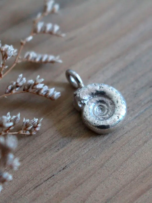 The cycle of life, eternal Ammonite pendant in sterling silver