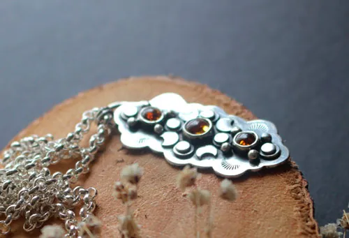 The cycle of the seasons, autumn equinox necklace in silver and amber