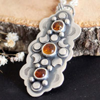 The cycle of the seasons, autumn equinox necklace in silver and amber