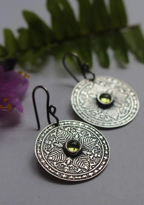 The earth, terrestrial mandala earrings in silver and peridot