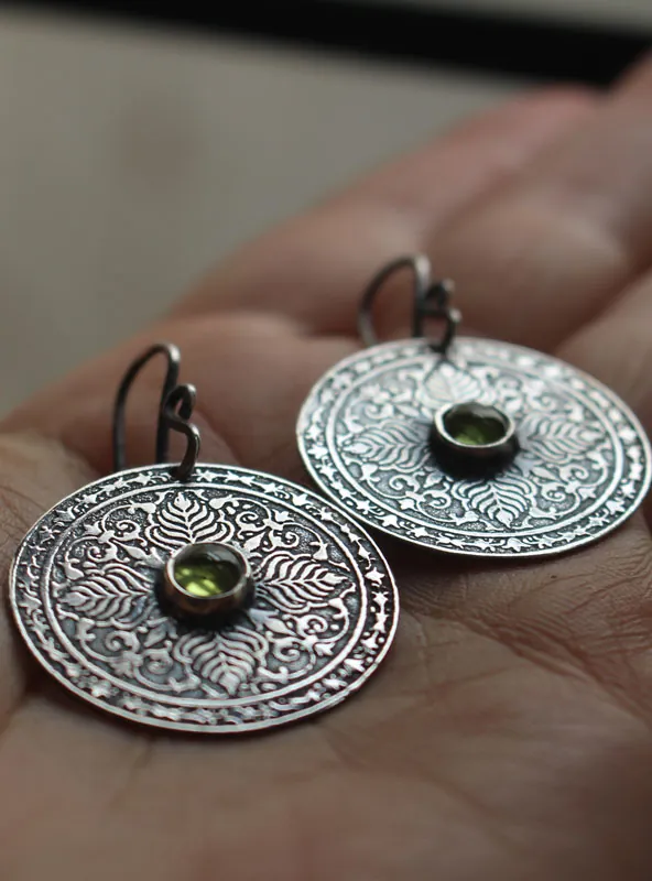 The earth, terrestrial mandala earrings in silver and peridot