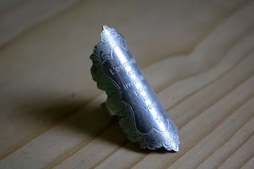 The essential, quote from the Little Prince by Saint-Exupéry ring in silver