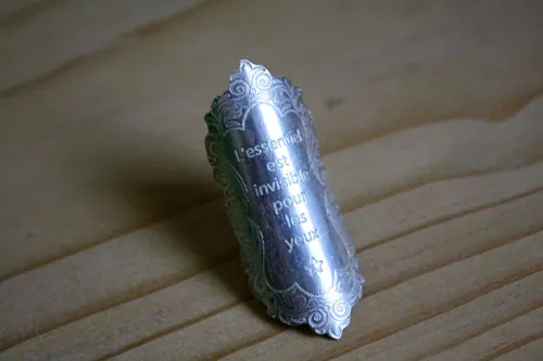 The essential, quote from the Little Prince by Saint-Exupéry ring in silver