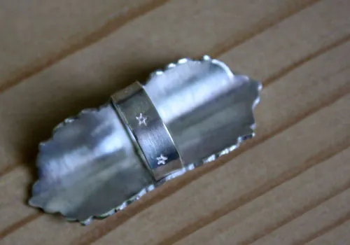 The essential, quote from the Little Prince by Saint-Exupéry ring in silver