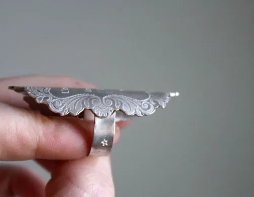 The essential, quote from the Little Prince by Saint-Exupéry ring in silver