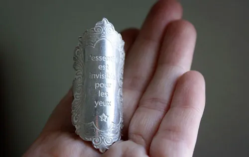 The essential, quote from the Little Prince by Saint-Exupéry ring in silver