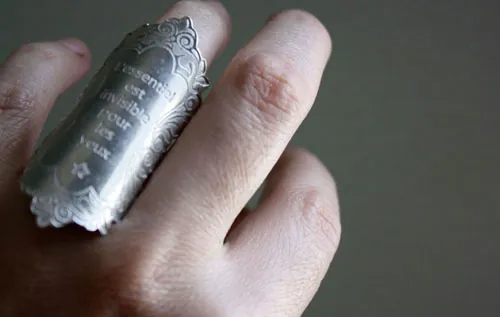 The essential, quote from the Little Prince by Saint-Exupéry ring in silver