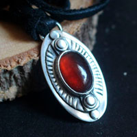 The eye of dreams, encouragement necklace in silver and garnet