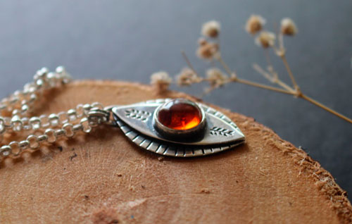 The eye of nature, enchanted autumn necklace in silver and amber