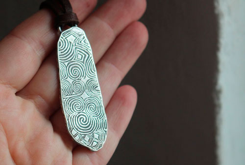 The guardian stone of Newgrange, Neolithic stele from Ireland pendant in silver