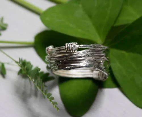 The roots of chance, weaving the Greek thread of life ring in silver