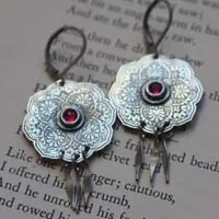 The rose of the Orient, oriental rosette earrings in silver and ruby