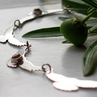 The song of the sun, bird necklace in silver and yellow zircon