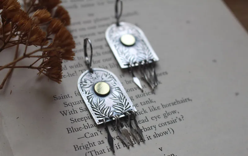 The stargate, silver and brass earrings