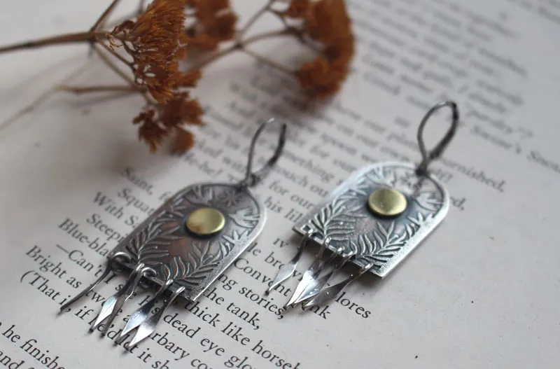 The stargate, silver and brass earrings