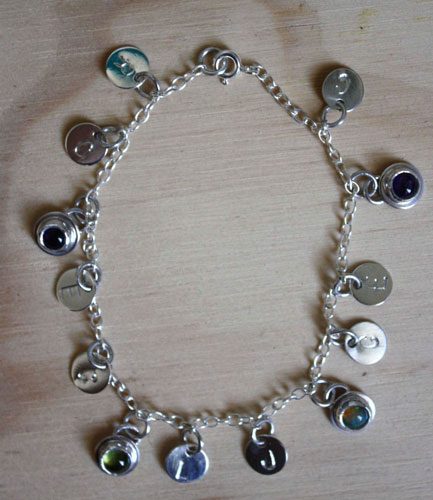 The tree of Jesse, family keepsake bracelet in silver with amethyst, opal, and peridot