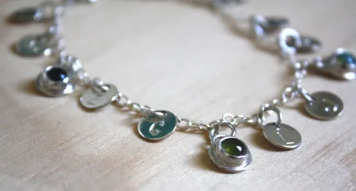 The tree of Jesse, family keepsake bracelet in silver, amethyst, opal, and peridot