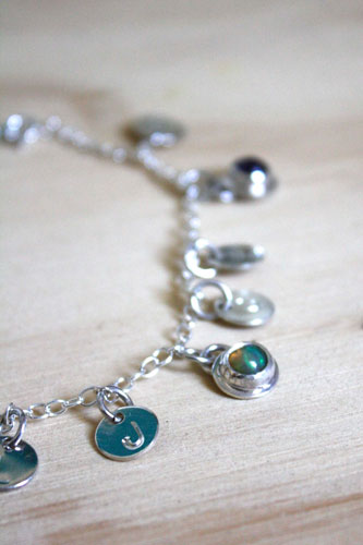 The tree of Jesse, family keepsake bracelet in silver with amethyst, opal, and peridot