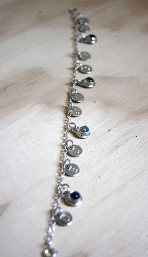 The tree of Jesse, family keepsake bracelet in silver, amethyst, opal, and peridot