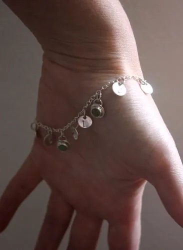 The tree of Jesse, family keepsake bracelet in silver, amethyst, opal, and peridot