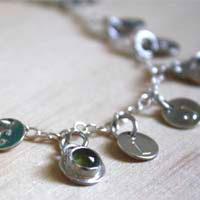 The tree of Jesse, family keepsake bracelet in silver with amethyst, opal, and peridot