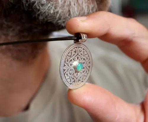 The tree of the sacred enclosure, medieval shield pendant in silver and chrysoprase