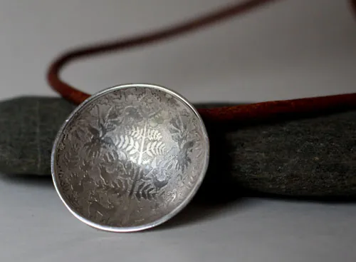 The unknown glade, Otomi flora and fauna necklace in silver and leather