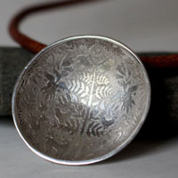 The unknown glade, Otomi flora and fauna necklace in silver and leather