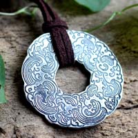 The wind and the sea, Japanese circle of clouds and waves necklace in silver