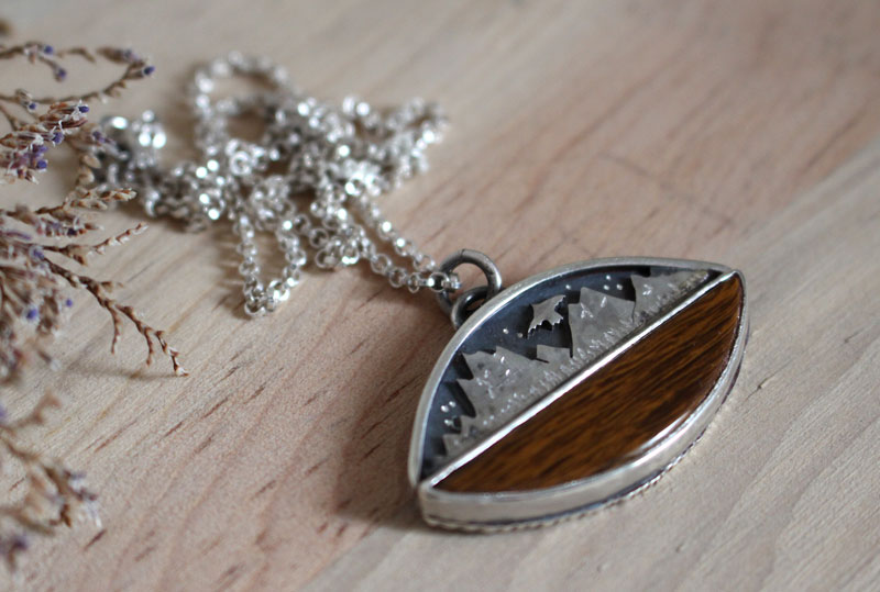 To the heavens, mountain eagle necklace in silver and fossilized wood