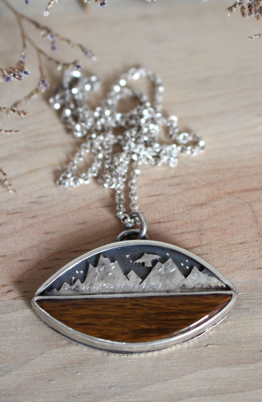 To the heavens, mountain eagle necklace in silver and fossilized wood