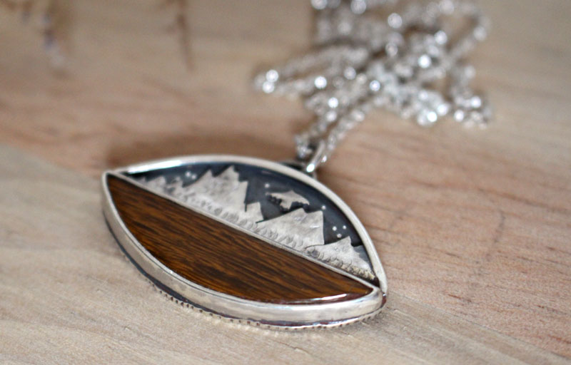 To the heavens, mountain eagle necklace in silver and fossilized wood