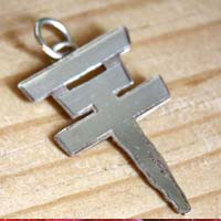 Tokio Hotel, the pop rock band’s cross logo pendant in sterling silver