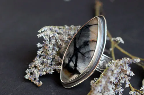 Tornado, storm in the mountains ring in silver and Picasso marble