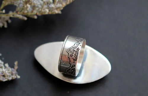 Tornado, storm in the mountains ring in silver and Picasso marble