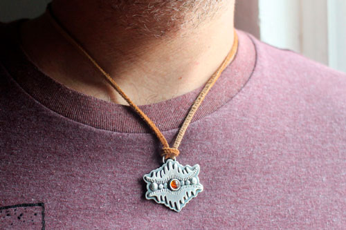 The eye of the earth, tribal mountain necklace in silver and amber