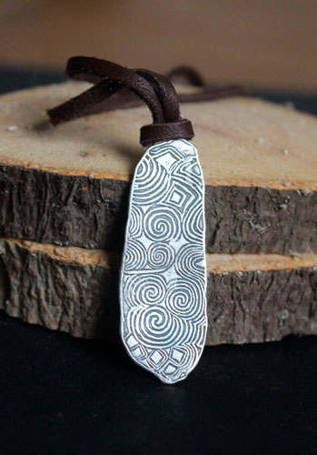 The stone guard of Newgrange, Irish Neolithic stele necklace in silver