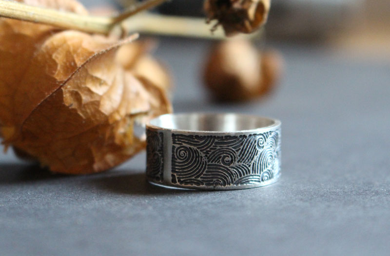 The wind, air symbol ring in sterling silver