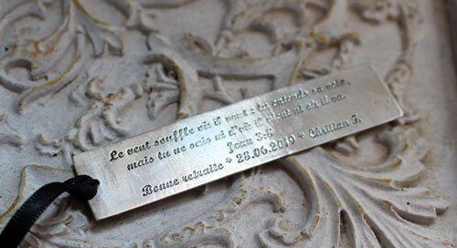 The wind blows, engraved quote bookmark in sterling silver