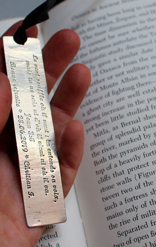 The wind blows, engraved quote bookmark in sterling silver