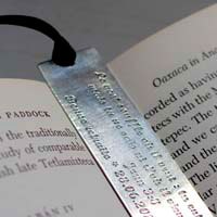 The wind blows, engraved quote bookmark in sterling silver